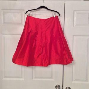 Red pleated silk skirt